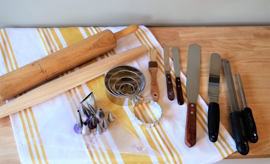 rolling pins, cookie cutters, palette knives, piping bags and tips